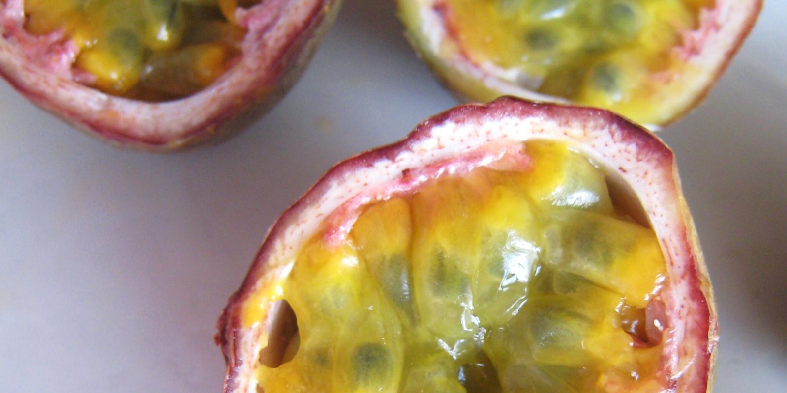 With their vigorous growth and ability to tolerate sandy soil, passionfruits grow great on Aotea. Photo / Paul Munhoven / CC