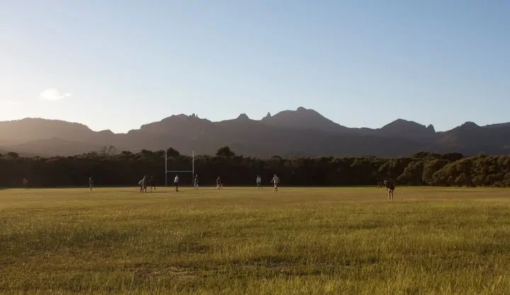 The field at the local sports club is privately owned and depend on the Local Board to assist with funding. Photo / GreatBarrier.co.nz