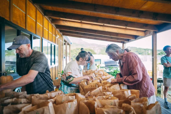 Community Spirit: The Aotea Growers & Makers Market at Claris Centre, a showcase of Great Barrier Island's finest local produce, crafts, and culinary delights. Photo / Manaaki Media
