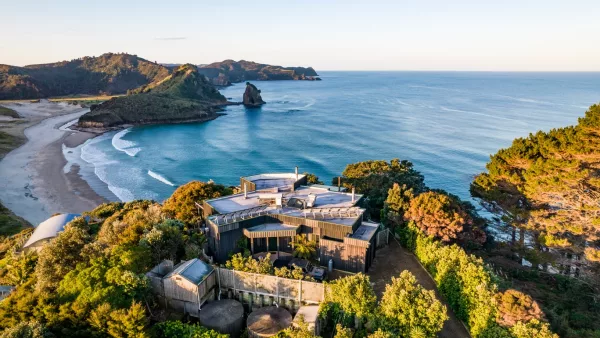 The bach on Aotea Road, on Great Barrier Island, attracted strong buyer interest when it hit the market last year. Photo / Supplied