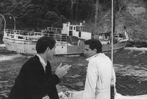 David Gapes (right) near the pirate radio ship Tiri aground on Great Barrier Island. Photo / Herald Historic Archive