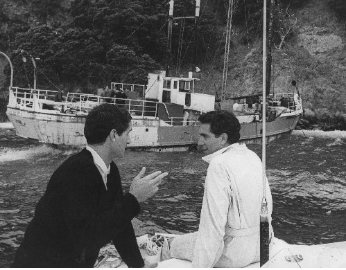 David Gapes (right) near the pirate radio ship Tiri aground on Great Barrier Island. Photo / Herald Historic Archive
