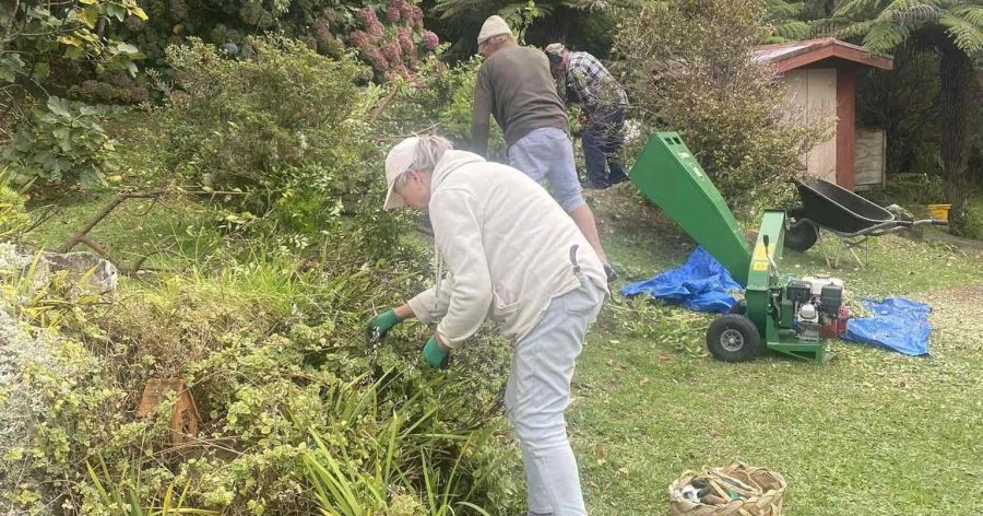 Aotea Army volunteers in action, transforming a garden with community spirit on Great Barrier Island. Photo / Aotea Army