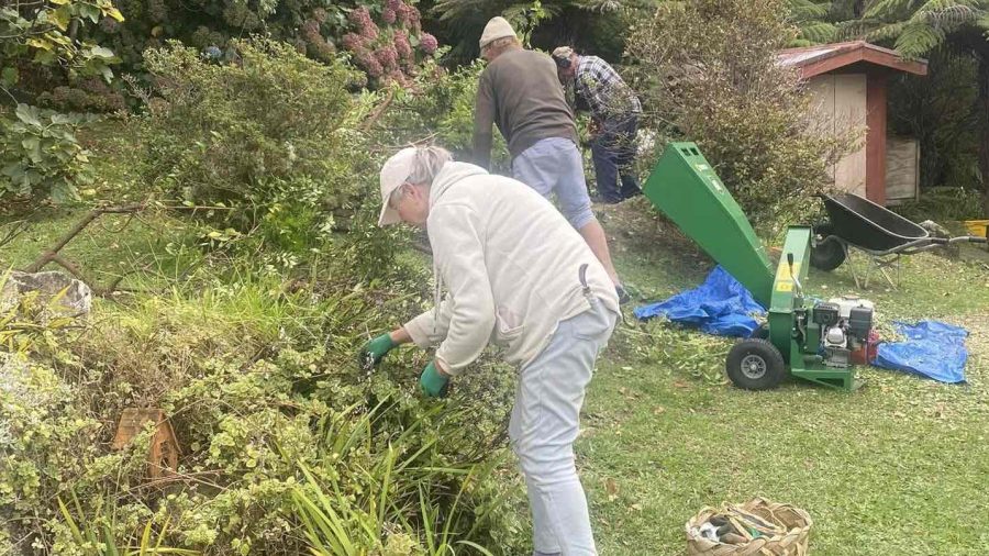 Aotea Army volunteers in action, transforming a garden with community spirit on Great Barrier Island. Photo / Aotea Army