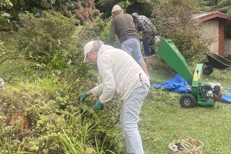 Aotea Army volunteers in action, transforming a garden with community spirit on Great Barrier Island. Photo / Aotea Army