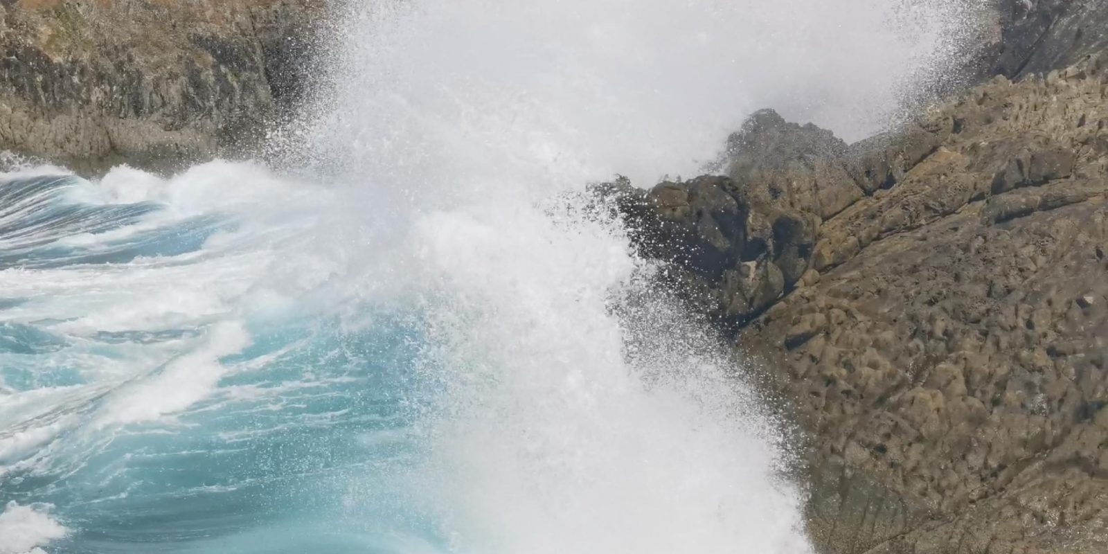 Waves crash against the rocks on Aotea's east coast, foreshadowing the high winds and thunderstorms to come. Photo / Will Trafford