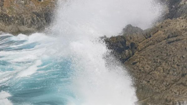 Waves crash against the rocks on Aotea's east coast, foreshadowing the high winds and thunderstorms to come. Photo / Will Trafford