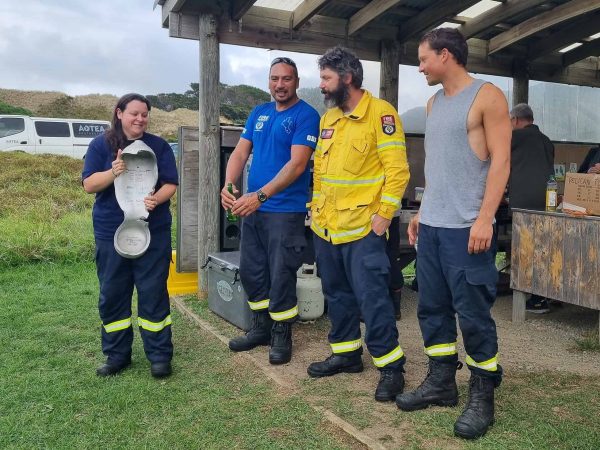 Tryphena 2 Takes the Trophy! Their cool heads and disciplined approach earned them the top spot in the Great Barrier Island fire crew time trial. Photo / Leanne Sanderson via Barrier Bulletin