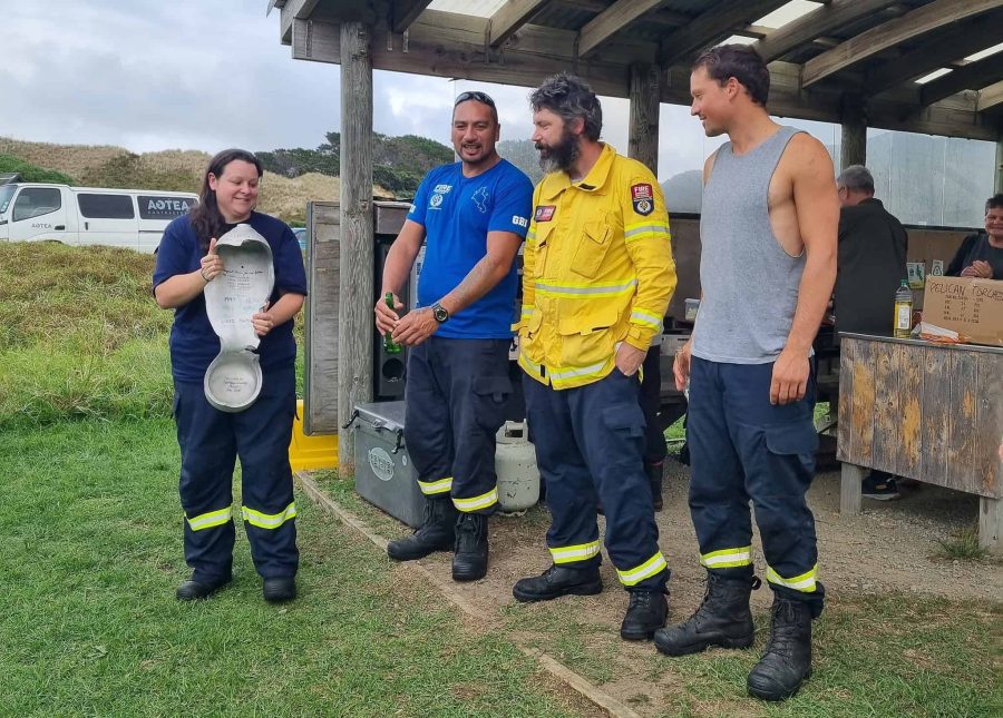 Tryphena 2 Takes the Trophy! Their cool heads and disciplined approach earned them the top spot in the Great Barrier Island fire crew time trial. Photo / Leanne Sanderson via Barrier Bulletin