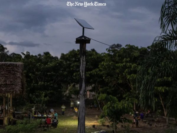 A Starlink antenna stands tall amidst the Marubo community, symbolizing the intersection of tradition and modernity as the tribe navigates the benefits and challenges of unfettered internet access. Photo / NYTimes