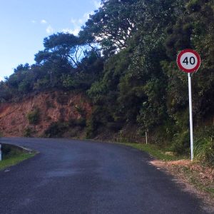 New speed limit signs on Great Barrier Island spark debate—are they safety measures or just another sign of the city's trappings creeping in?