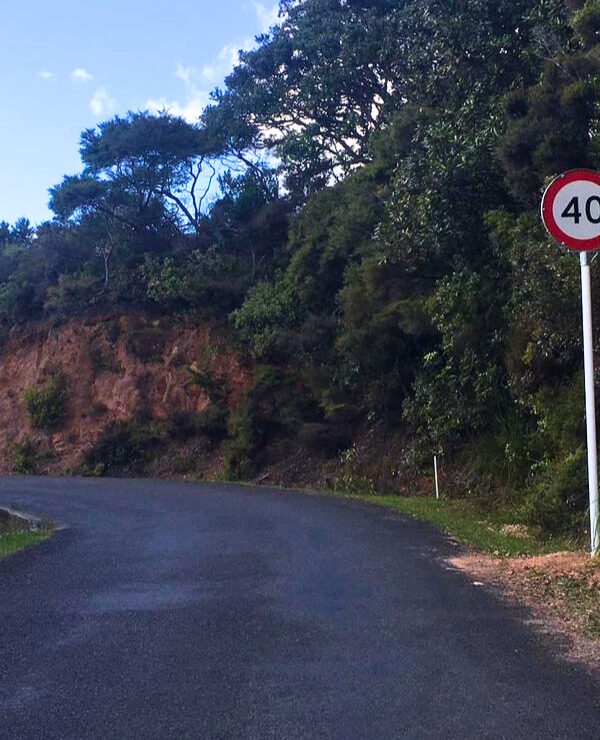 New speed limit signs on Great Barrier Island spark debate—are they safety measures or just another sign of the city's trappings creeping in?