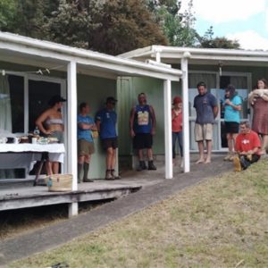 Aotea Army in action: Volunteers from the community work together during a working bee day at Kate Langford's home, demonstrating the power of collective effort in transforming and beautifying local spaces.