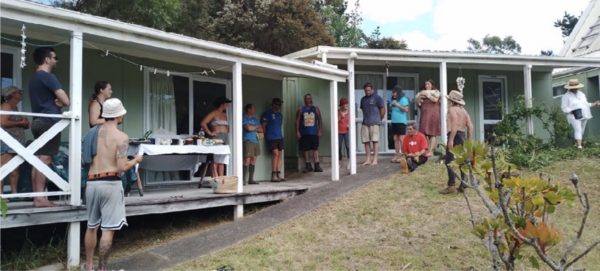 Aotea Army in action: Volunteers from the community work together during a working bee day at Kate Langford's home, demonstrating the power of collective effort in transforming and beautifying local spaces.