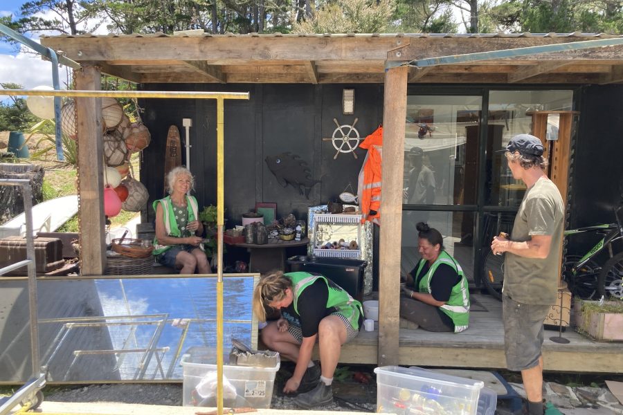 Community Strength in Action: Volunteers unite for a clean-up day at Anamata, restoring hope and order after the unexpected fire.