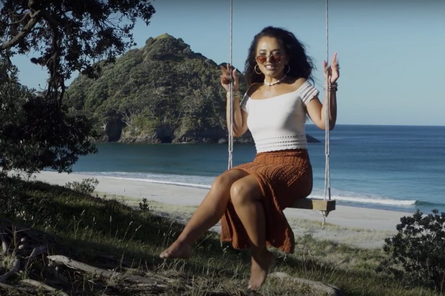 Waii in her element — against the wild, open backdrop of Great Barrier Island, where Bumble Bee feels right at home. Photo / Waii Music