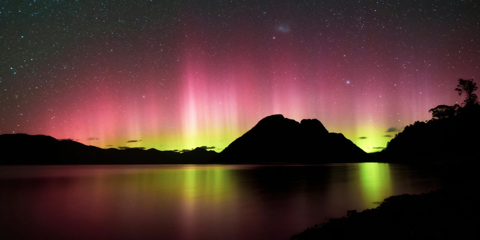 Southern Lights could put on a show over Great Barrier skies this week — locals are urged to look south with cameras ready. Photo / Tristan Pokornyi