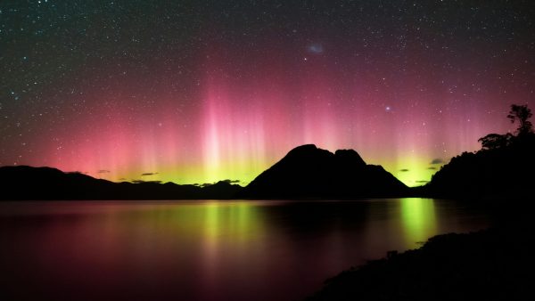 Southern Lights could put on a show over Great Barrier skies this week — locals are urged to look south with cameras ready. Photo / Tristan Pokornyi