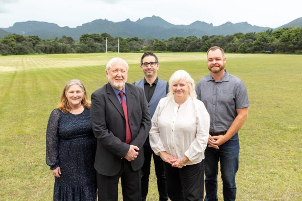 The newly sworn-in Great Barrier Local Board, from left: Nikki Watts, Christopher Ollivier, Neil Sanderson, Izzy Fordham and Ryan Daly, following Thursday’s pōhiri at the Claris Conference Centre.