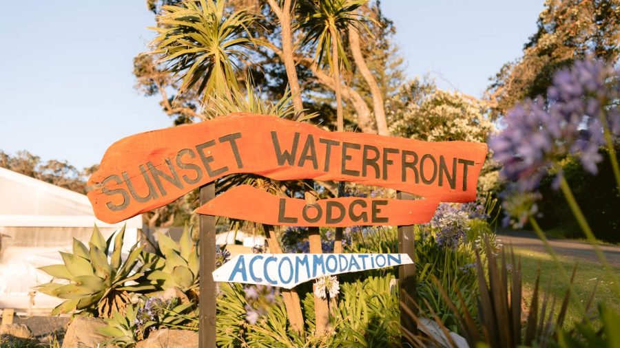 Sunset Waterfront Lodge sits opposite the beach at Mulberry Grove, a familiar landmark for visitors arriving in Tryphena.