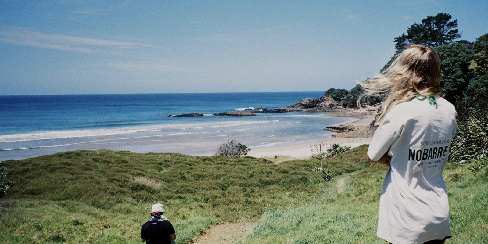 “Taking in the view: a retreat attendee pauses on the Barrier, soaking up the island’s off-grid inspiration.”