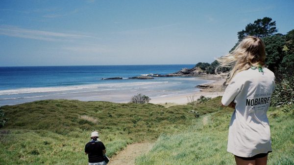 “Taking in the view: a retreat attendee pauses on the Barrier, soaking up the island’s off-grid inspiration.”