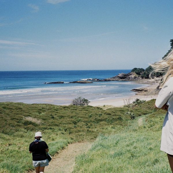 “Taking in the view: a retreat attendee pauses on the Barrier, soaking up the island’s off-grid inspiration.”