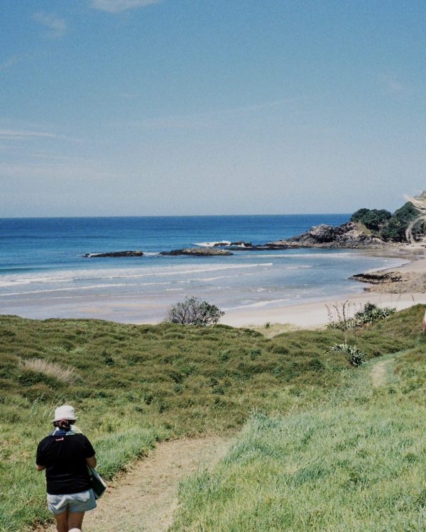 “Taking in the view: a retreat attendee pauses on the Barrier, soaking up the island’s off-grid inspiration.”