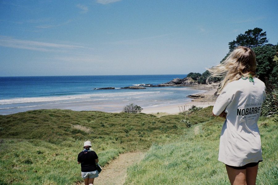 “Taking in the view: a retreat attendee pauses on the Barrier, soaking up the island’s off-grid inspiration.”
