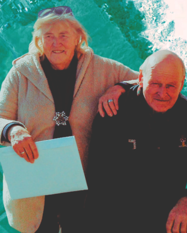 Composite image of Charlie and Winnie Blackwell above the Kaitoke flats on Great Barrier Island, showing the mānuka scrub and swamp area at the centre of the Council’s investigation.